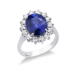 Halo ring in white gold 18k with diamonds and central blue sapphire