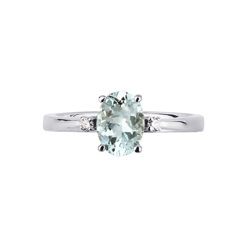 18k white gold ring with central aquamarine and lateral diamonds  18k white gold ring with central aquamarine and lateral diamonds