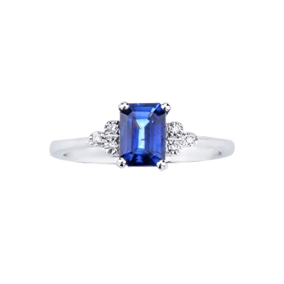 White gold 18k ring with a blue sapphire oval cut and bezel diamonds 