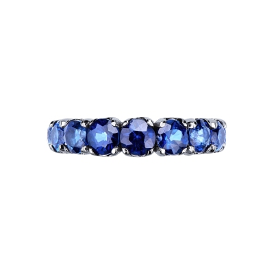 18k white gold half eternity ring with blue sapphires