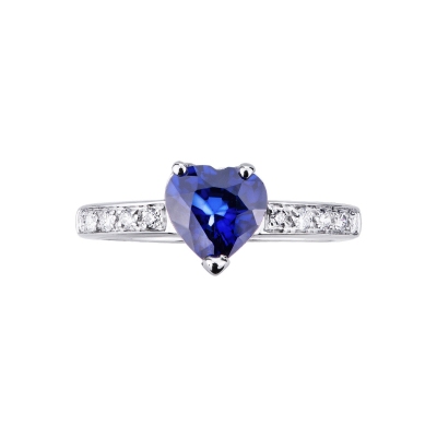 750 white gold ring with central blue sapphire and diamonds
