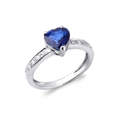 750 white gold ring with central blue sapphire and diamonds