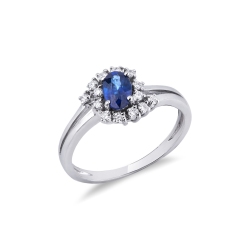 White gold 18k halo ring with diamonds and a central blue sapphire