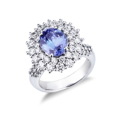 Ring in white gold 18k with double halo in diamonds and central tanzanite