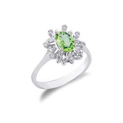 Modern halo setting ring with green peridot and diamonds in 18kt white gold