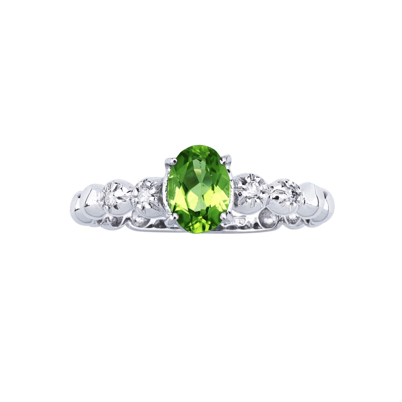 18k white gold ring with 4 lateral diamonds and central peridot