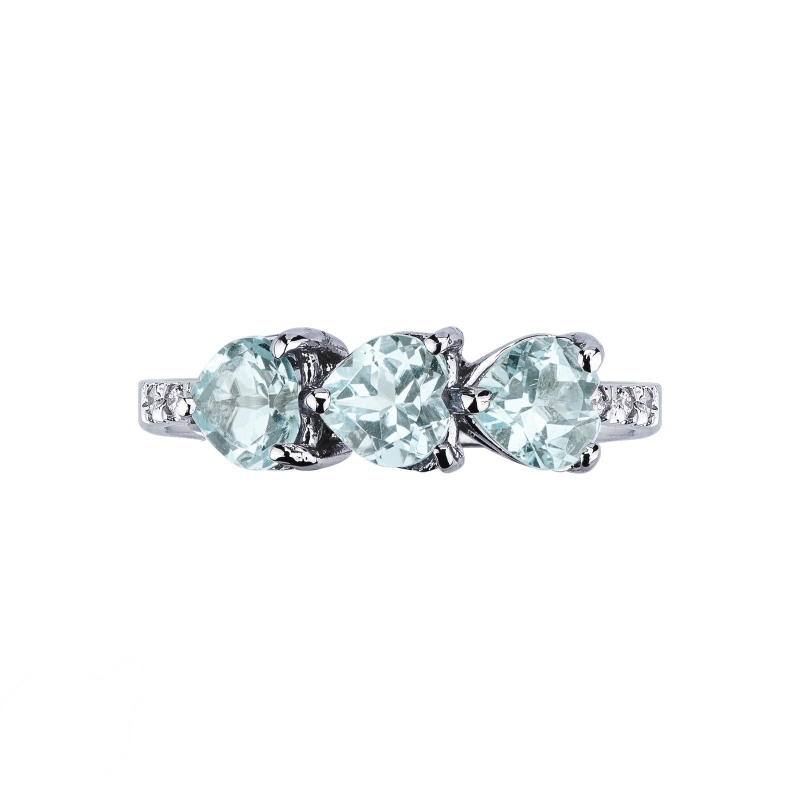 White gold 18k ring with three aquamarines heart cut and diamonds shoulder set  White gold 18k ring with three aquamarines heart cut and diamonds shoulder set