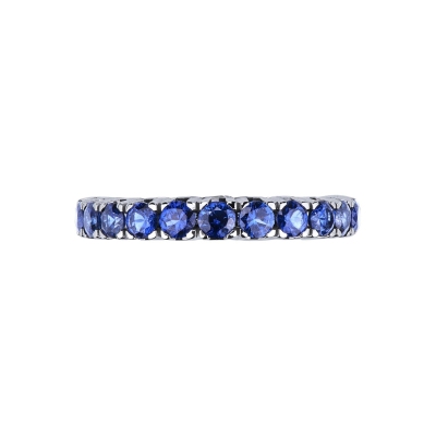 Eternity ring with blue sapphires in 18kt white gold