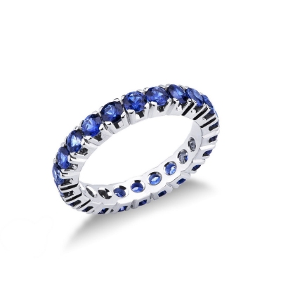 Eternity ring with blue sapphires in 18kt white gold