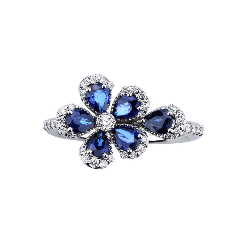Flower ring in white gold 750 with blue sapphires and diamonds Flower ring in white gold 750 with blue sapphires and diamonds