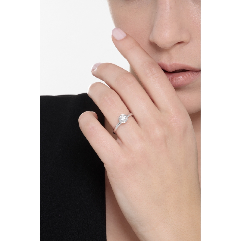 Bezel-set solitaire diamond ring in 18kt white gold  Bezel-set solitaire diamond ring in 18kt white gold