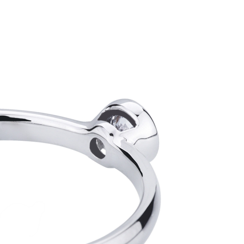 Bezel solitaire ring with a 0,15 ct diamond white gold 18k Bezel solitaire ring with a 0,15 ct diamond white gold 18k