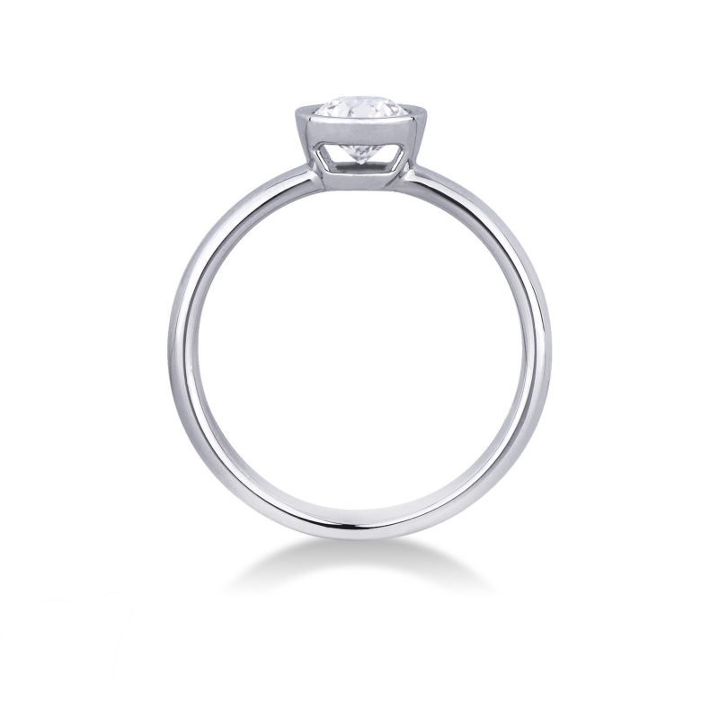 Bezel-set solitaire diamond ring in 18kt white gold  Bezel-set solitaire diamond ring in 18kt white gold