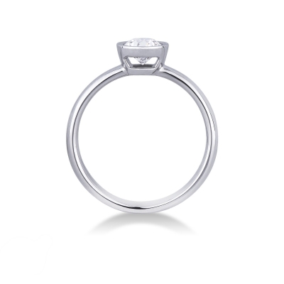 Bezel-set solitaire diamond ring in 18kt white gold 
