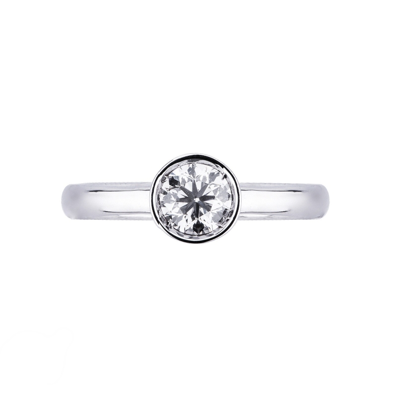 Bezel-set solitaire diamond ring in 18kt white gold  Bezel-set solitaire diamond ring in 18kt white gold