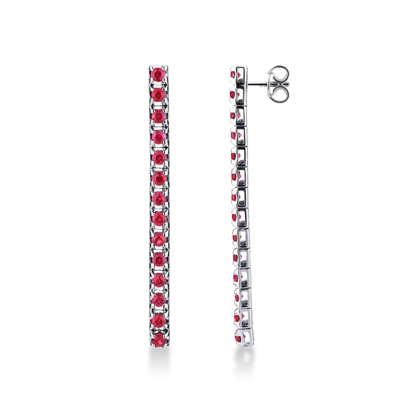 Drop tennis earrings with rubies in 18k white gold