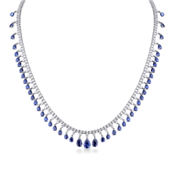 750 white gold tennis design necklace with diamonds and blue sapphires