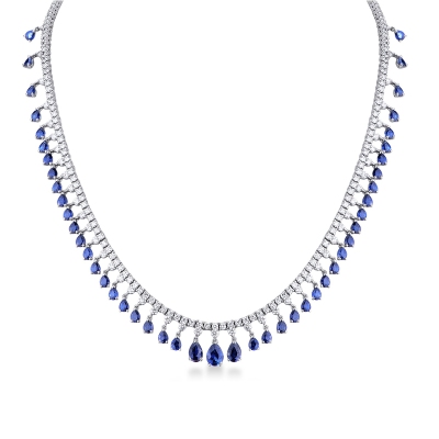 750 white gold tennis design necklace with diamonds and blue sapphires