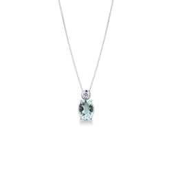 Oval aquamarine pendant with diamond