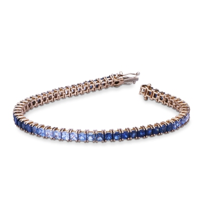 Fancy 18k rose gold tennis bracelet with blue sapphires