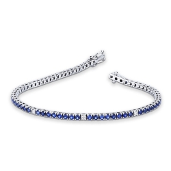750 white gold tennis bracelet with blue sapphires and diamonds