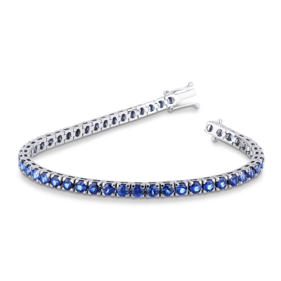 18k white gold tennis bracelet with blue sapphire