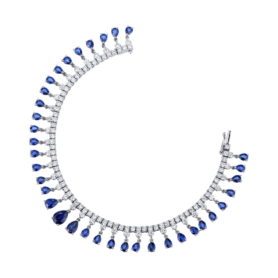 Tennis design bracelet with diamonds and blue sapphires in gold 750