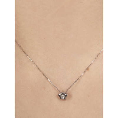 18k white gold necklace with star pendant and diamond