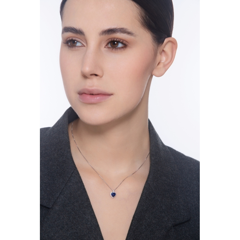 18k white gold necklace with blue sapphire heart pendant and diamonds