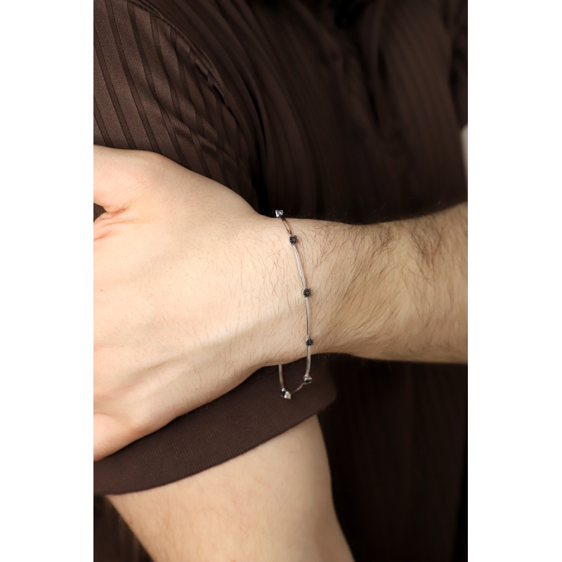 Bracelet in white gold 18k with 8 black diamonds burnished tips, 20 cm