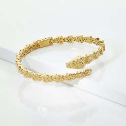 18k yellow gold snake bracelet with a polished and satin finish 2