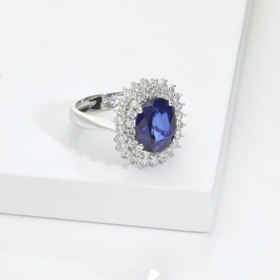 Lady D Ring with double diamond halo and blue sapphire