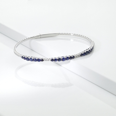 Bangle in 18k white gold with blue sapphires and diamonds 