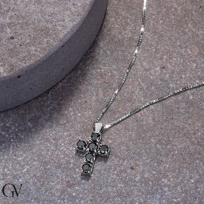 Cross pendant with black diamonds