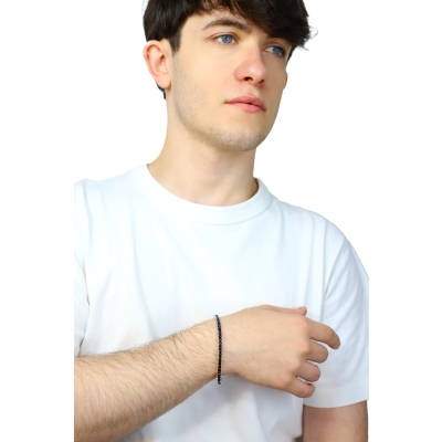 Tennis bracelet elastic in 750 white gold with black diamonds