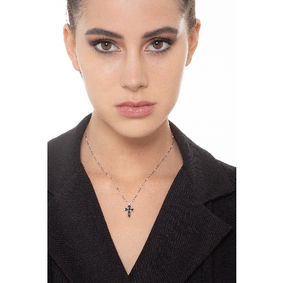 Cross pendant with black diamonds