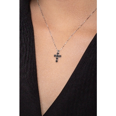 Cross pendant with black diamonds