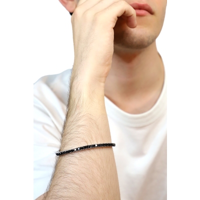 Elastic tennis bracelet with black diamonds in 750 white gold