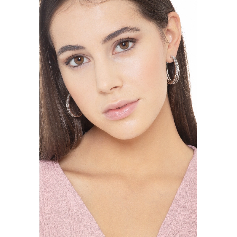 White gold 18k oval earrings with three diamonds rows  White gold 18k oval earrings with three diamonds rows