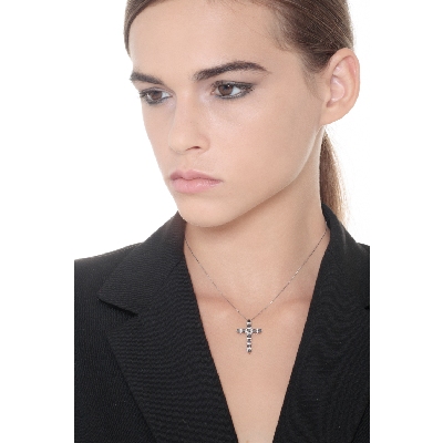 Cross pendant with black and white diamonds