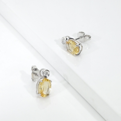 Yellow citrine and diamond stud earrings in 18kt white gold