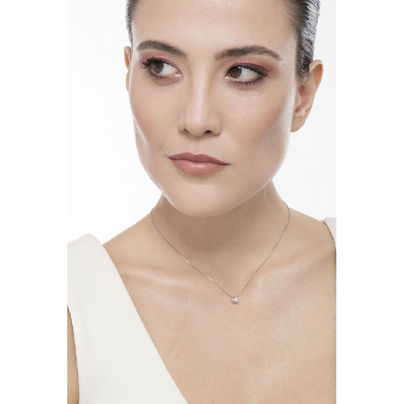 18k white gold full bezel solitaire necklace with 0.07 ct diamond 18k white gold full bezel solitaire necklace with 0.07 ct diamond