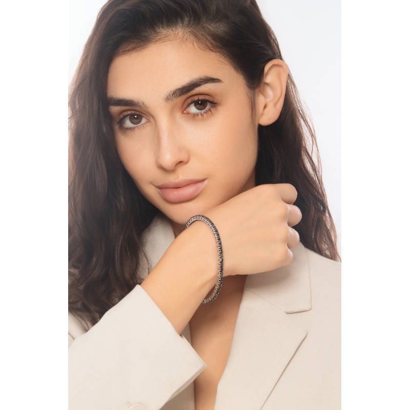 Elastic tennis bracelet with black diamonds in 750 white gold