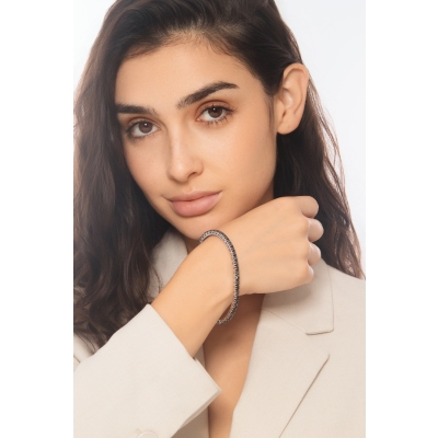 Elastic tennis bracelet with black diamonds in 750 white gold