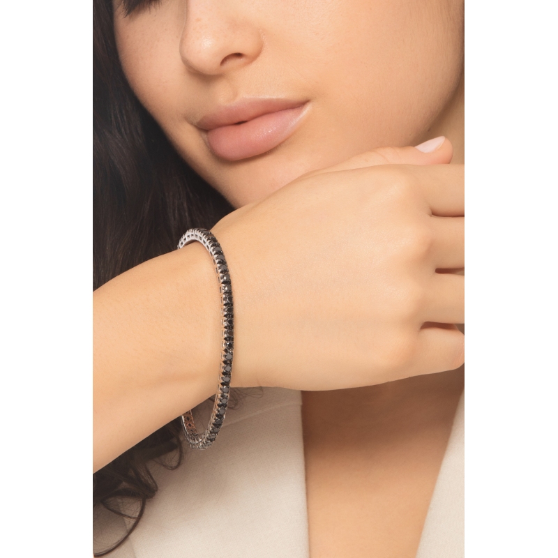 Elastic tennis bracelet with black diamonds in 750 white gold
