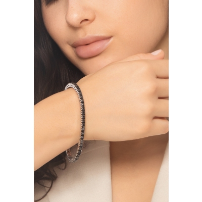Elastic tennis bracelet with black diamonds in 750 white gold