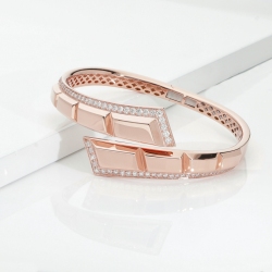 Bypass semi-rigid bracelet with diamonds in 18kt rose gold