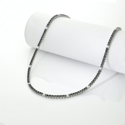Black and white diamond tennis necklace in 18kt white gold 
