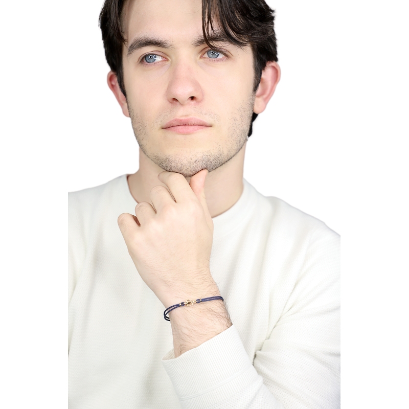 Anchor charm blue rope bracelet in 18kt yellow gold