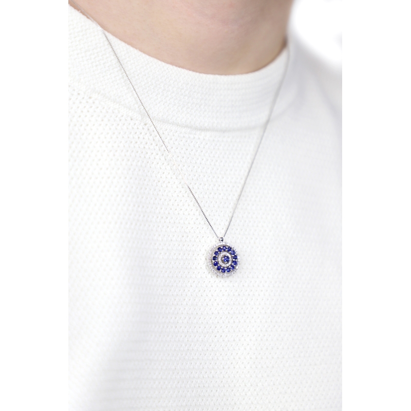 Round pendant necklace with diamonds and sapphires in 18kt white gold